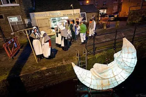 Preparing to rake the moon along the canal