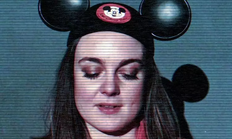Lydia Cottrell in a Mickey Mouse hat