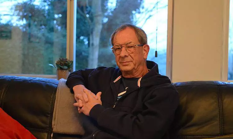 Author Chris Nickson relaxing on a couch at home