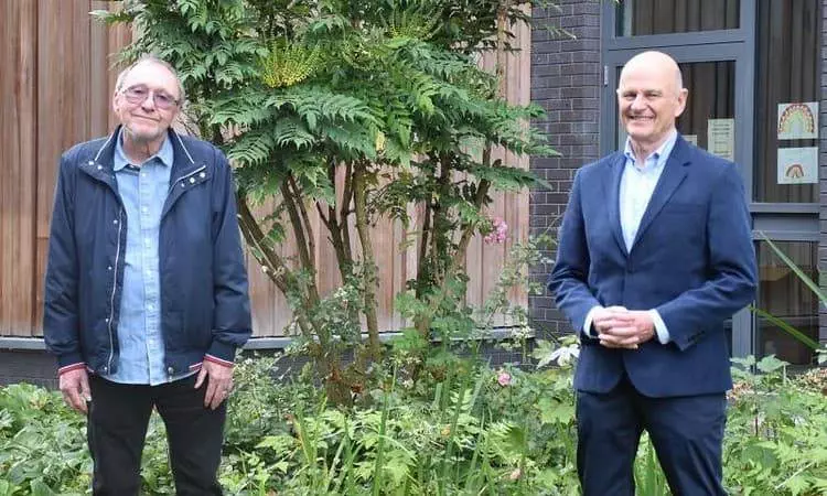 Michael Yates (left) social distancing with the then hospitals Chief Executive Martin Barkley